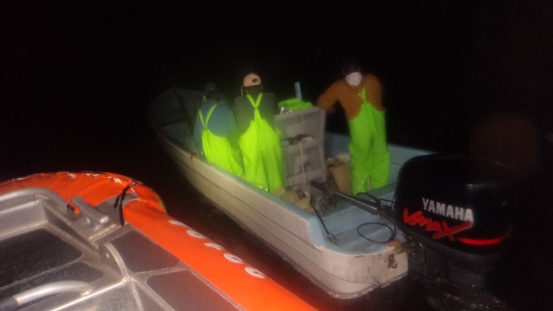 A lancha crew is escorted by Coast Guard law enforcement after they wee stopped fishing in federal waters off south Texas. Coast Guard photo.